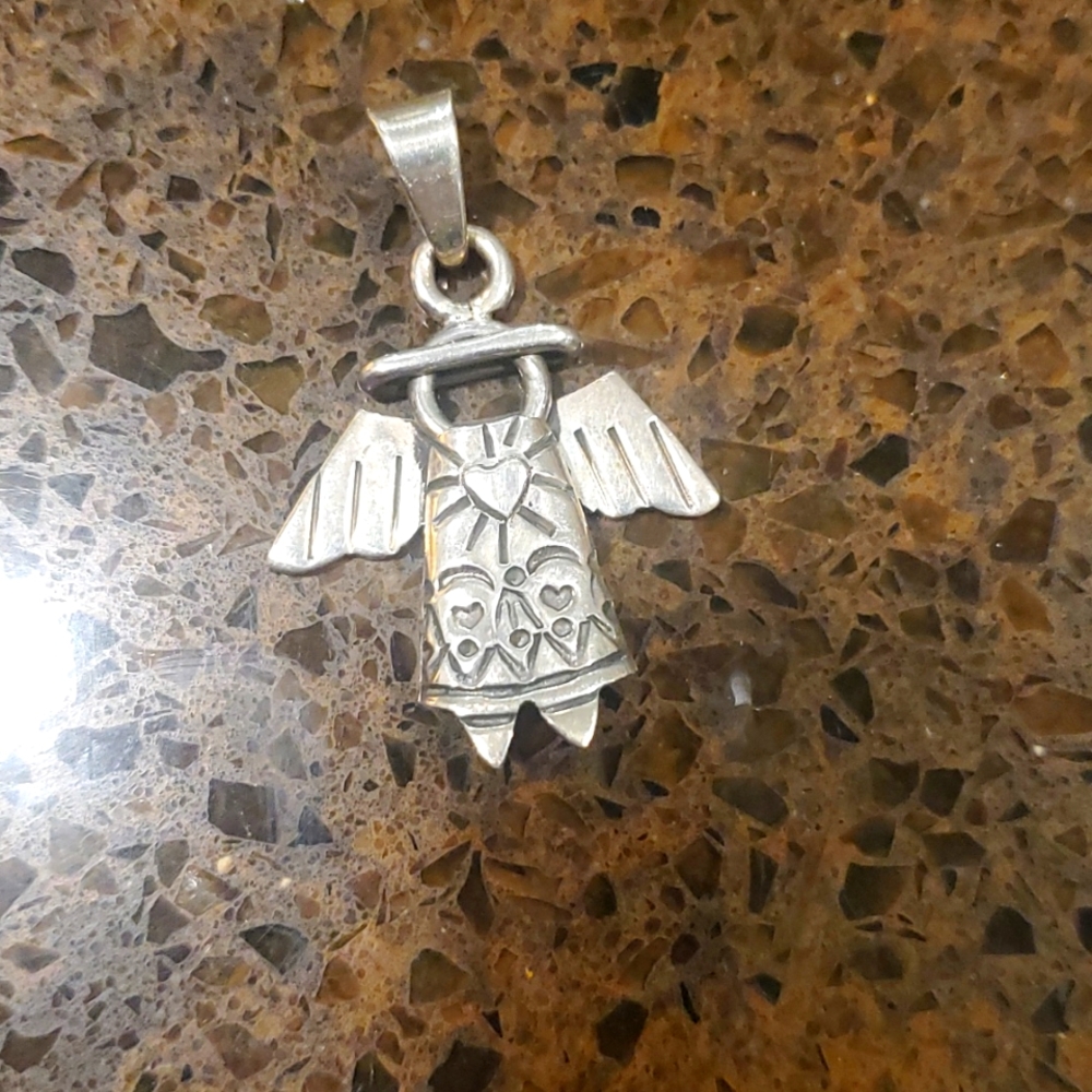 Silver angel charm